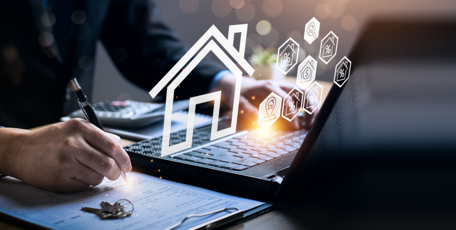 investor on computer researching economy housing market