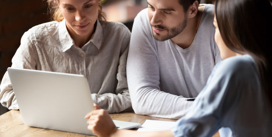real estate investor researching on computer